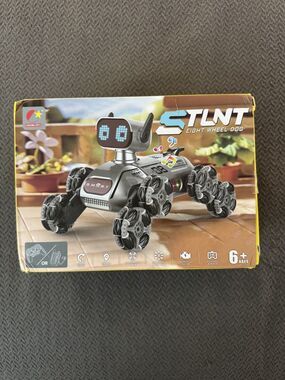 Remote Control Stunt Robot Dog Car 8-Wheel RC Toy Lights Music Spray 6+ NEW